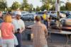 A Lineman speaks with customers at NOVEC's 2015 Annual Meeting